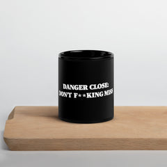 Danger Close warning on our black Glossy Mug