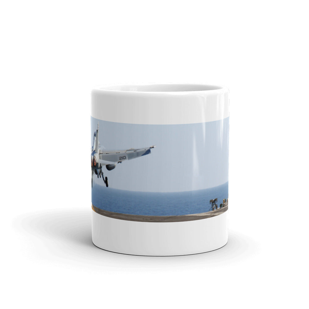 Two Hornets launch from the carrier on our white ceramic mug