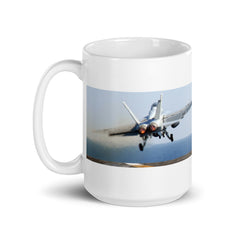 Two Hornets launch from the carrier on our white ceramic mug